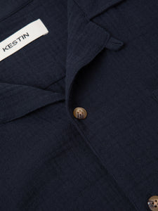 A close-up of the front of the KESTIN Crammond Shirt in navy blue.