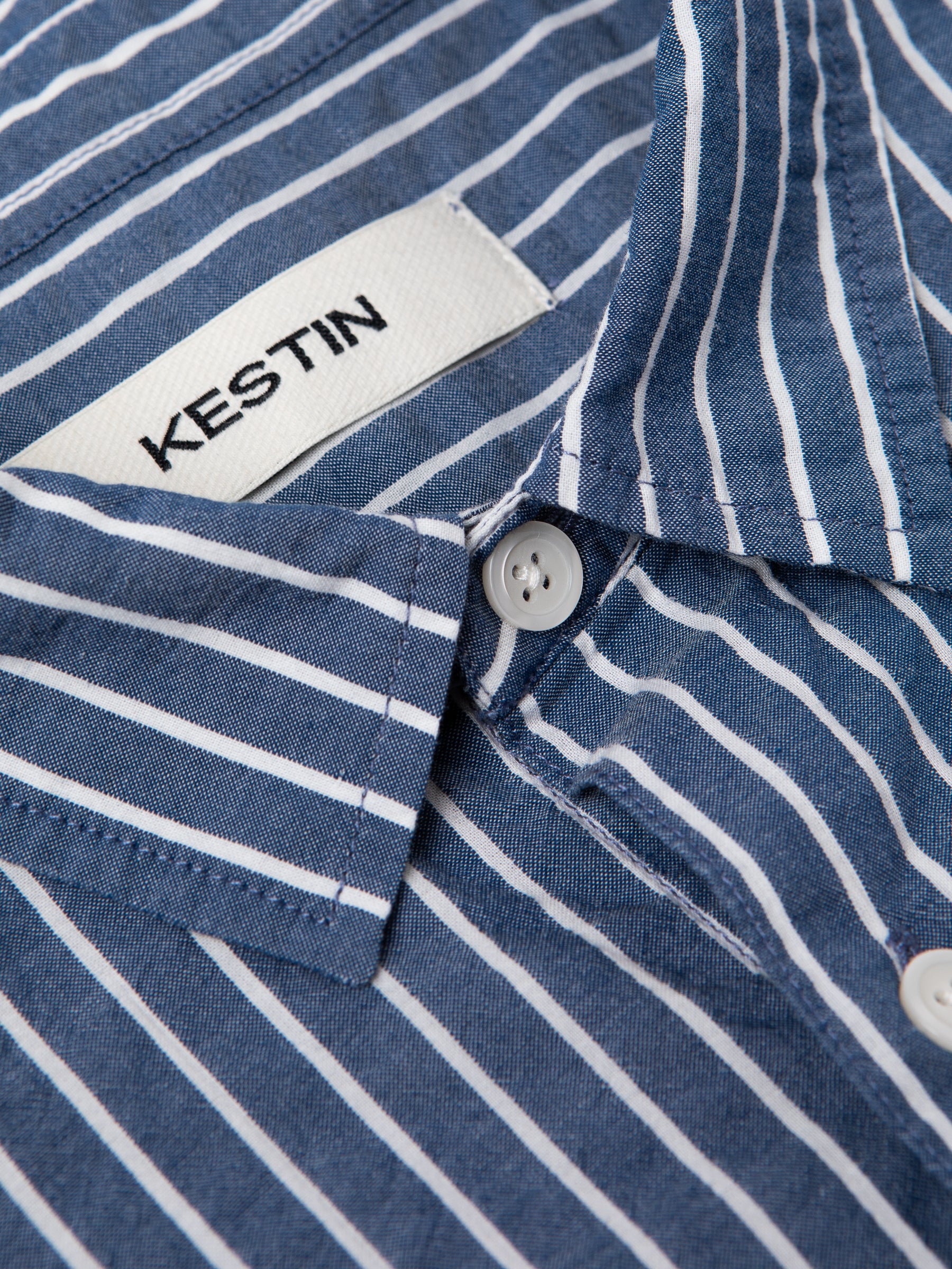 The collar of the KESTIN Aberlady Shirt in blue and white stripe.