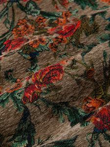 A unique olive green floral jacquard fabric, used by Scottish designer KESTIN.