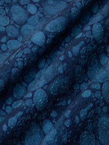 A blue printed fabric, used to make casual shirting by British menswear brand KESTIN.