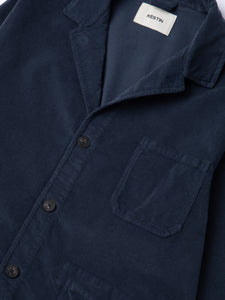 A close-up of the front of the KESTIN Port Jacket in navy blue corduroy.