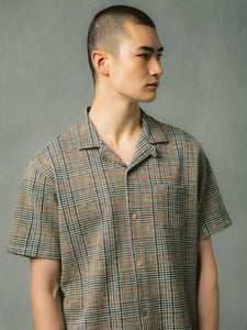 A model wearing a short sleeve shirt from Scottish menswear brand KESTIN.