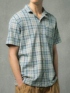 A model wearing the KESTIN Crammond Shirt in a printed Italian check.