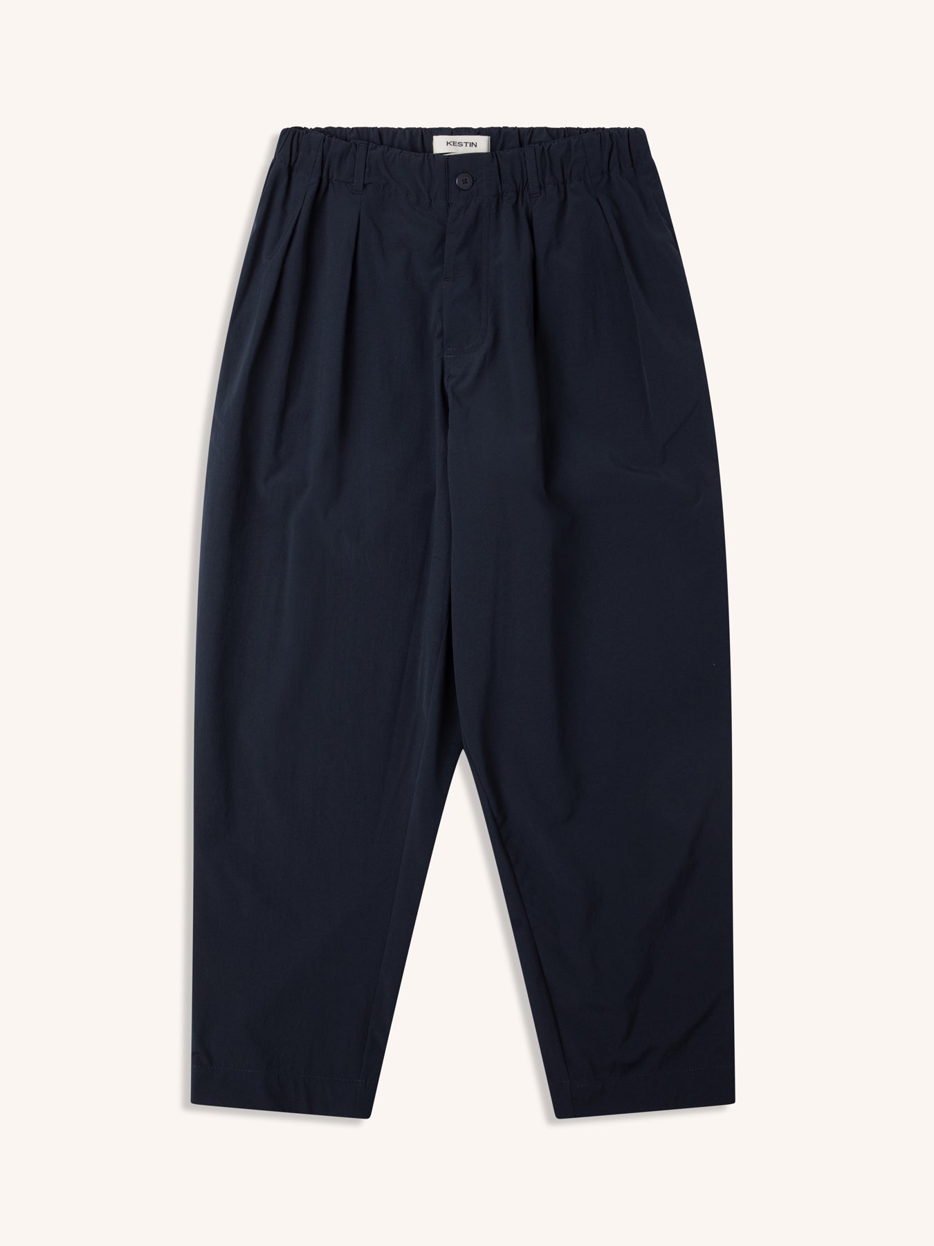 A pair of KESTIN Clyde Pants in dark navy blue, on a white background.