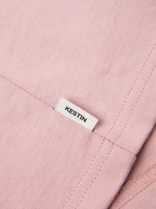 The woven flag label to the side of the KESTIN Fly Tee.