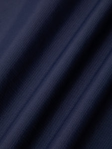 A navy nylon ripstop fabric used by menswear brand KESTIN in their SS25 Collection.