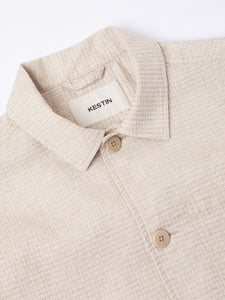 A close-up of the KESTIN Ormiston Jacket in ecru.