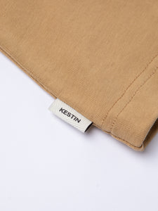 A woven flag label to the side of the KESTIN Cargill T-Shirt.