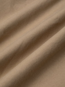 A khaki brown cotton twill fabric, used to make KESTIN Clyde Pants.