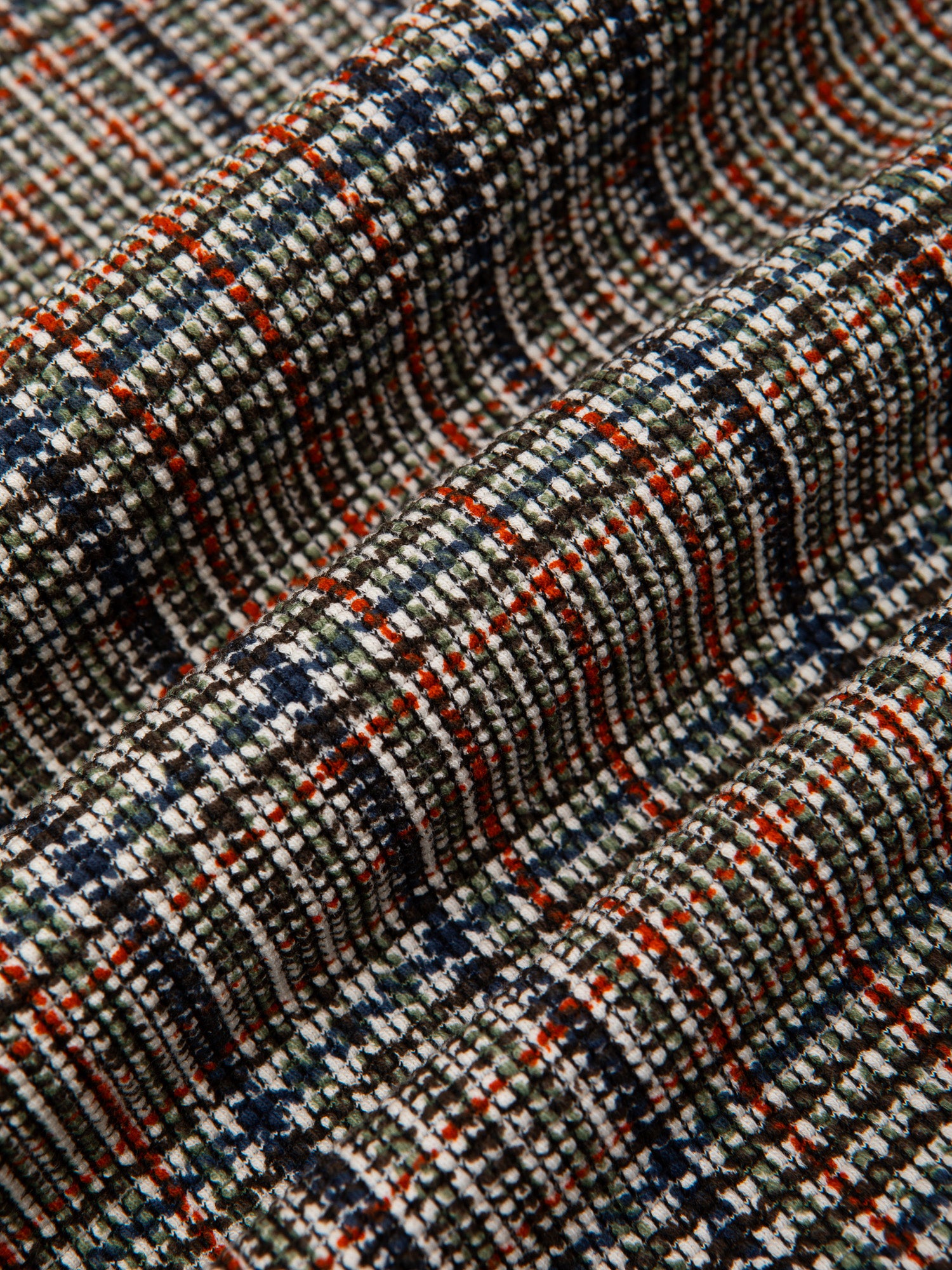 A printed check pattern on an Italian fabric, used by clothing brand KESTIN.