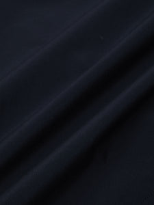 A lightweight technical fabric in navy blue, used by menswear brand KESTIN.