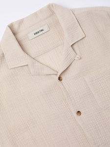 A close-up of the front and collar of the KESTIN Crammond Shirt in Ecru.