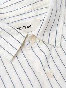 The collar of the KESTIN Dirleton Shirt in a white and blue seersucker fabric.